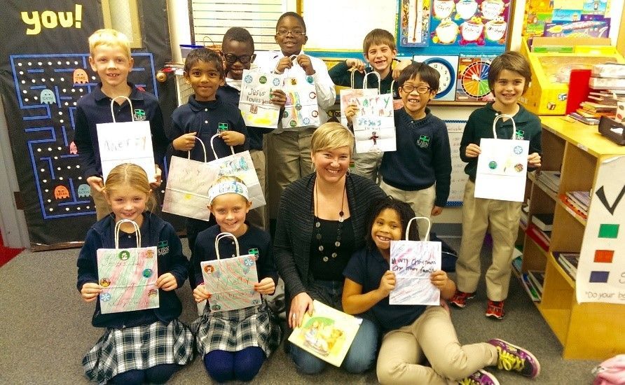 Kirk Day School 2nd graders surround Emily Nienhuis and daughter, Ruby.jpg